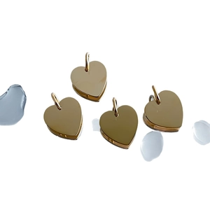 Gold heart-shaped stainless steel pendants for DIY jewelry making, tarnish resistant.