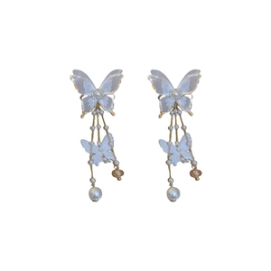 Elegant gold-tone butterfly drop earrings with white pearls and long tassel accents