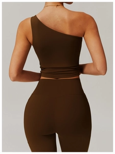 Back view of a chocolate brown one-shoulder yoga set with high-waist leggings and vest