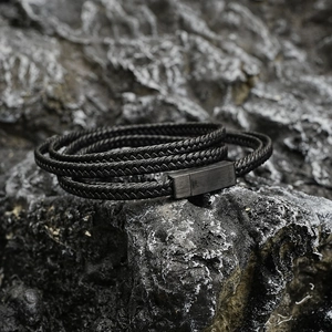 Vintage black braided leather bracelet for men with rectangular dark metal magnetic clasp