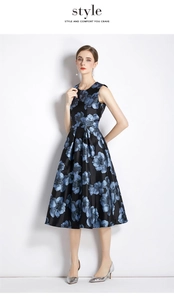Full view of sleeveless floral dress with satin sheen, cinched waist, and flared hem