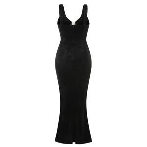 Close-up back view of a slim black slit evening dress with refined zipper and strap details