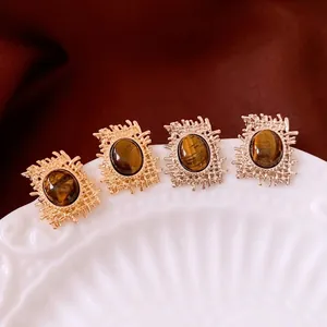Vintage gold oval tiger eye earrings with artistic branch textured frames for women