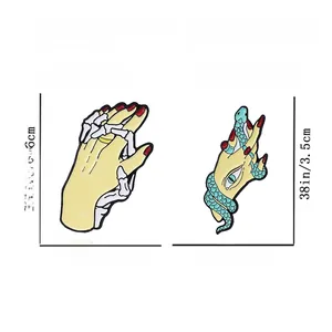 Detailed size and weight chart for creative surrealist snake and skeleton hand pins