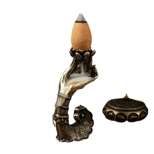 Bruciatore di incenso a riflusso a forma di mano di Buddha con base di loto antica