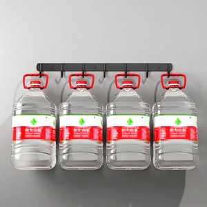 Strong adhesive stainless steel wall hooks holding heavy weights in a bathroom setting