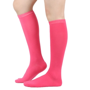 Detail of rose red knee high socks with triple stripes showing rib knit texture on leg