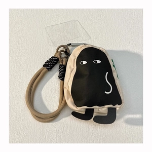 Detail of mini canvas pouch with woven rope strap and carabiner for keys and earphones