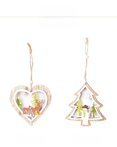 Detail view of heart and tree shaped wooden Christmas ornaments with reindeer and snowman
