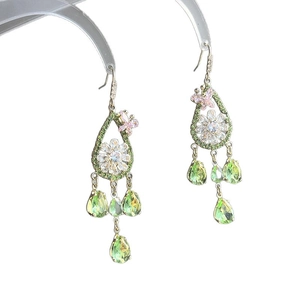 Elegant gold earrings with zircon butterfly floral motifs and green waterdrop pendants