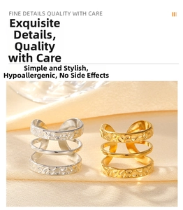 Detail of layered gold and silver rings with hammered texture and hypoallergenic finish