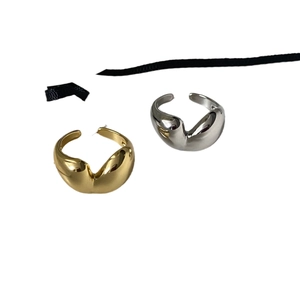 Minimalist gold and silver heart-shaped open rings with irregular streamlined design