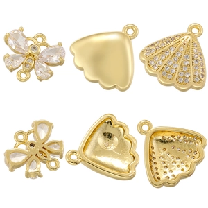 Détails de breloques dorées papillon et coquillage avec zircon clair et anneaux de métal
