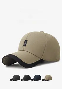 Detail of outdoor baseball cap with contrast brim and JFBE embroidered patch on front