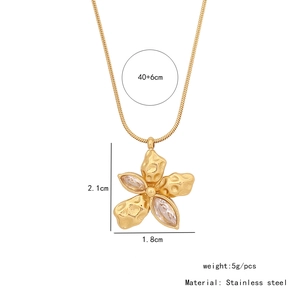 Detail of gold butterfly flower pendant with crystals on 40+6cm snake chain