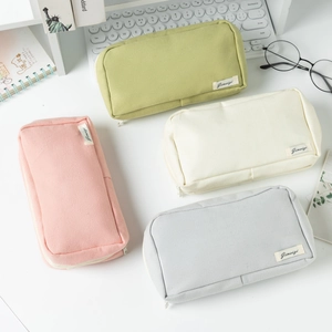 Set of 4 canvas pencil cases in pastel pink, green, white, and grey for students