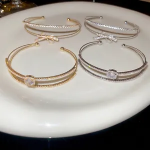 Elegant gold and silver double-layer open bracelets with zircon bow and square stone