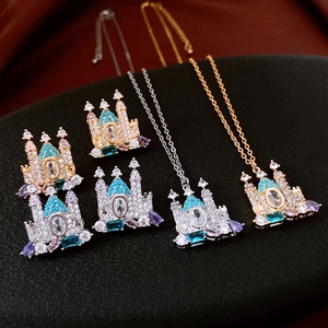 Detailed view of castle-shaped gold and silver jewelry sets with colorful gemstones