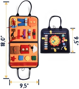 Detail view of felt busy board toy with clock, calendar, and sensory learning tools