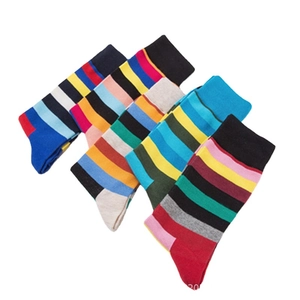 Colorful striped cotton crew socks for winter in red, blue, yellow, and pink colors