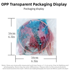 Pink and blue dream catcher wall hanging with feathers in transparent OPP packaging