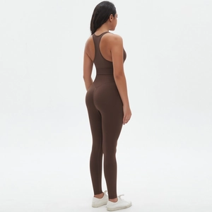 Detail view of coffee-colored seamless racerback yoga jumpsuit with body-shaping fit