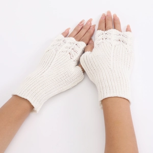 Close-up of knit fingerless gloves with elegant fish scale pattern and ribbed cuffs