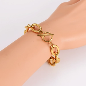 12mm gold chunky O-chain bracelet with OT toggle clasp on wrist for a retro hip-hop look