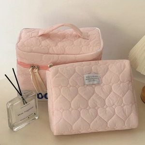 Pink quilted heart makeup bag set with top handle and flat pouch for travel storage