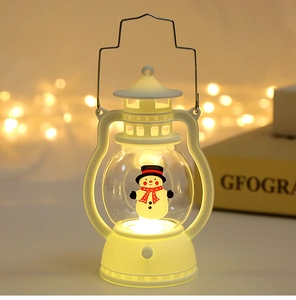 Detailed view of a white Christmas lantern featuring a cute snowman and warm LED lighting