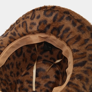 Detailed view of leopard faux fur hat interior with brown sweatband and adjustable drawstring