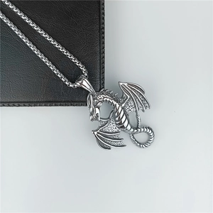 Vintage stainless steel dragon pendant necklace with a detailed flying dragon charm