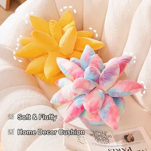 Colorful succulent plush pillows in pink-blue and yellow on a white fleece sofa