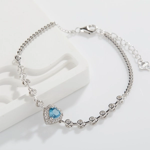 S925 sterling silver bracelet with heart-shaped blue topaz and sparkling diamonds