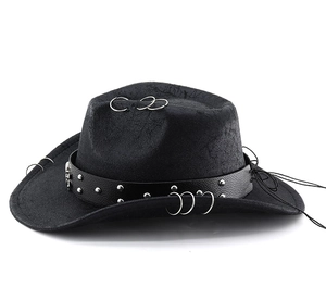 Close-up of black PU leather cowboy hat with metal skull rivets and silver ring details