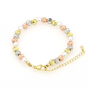 Detail of mixed-metal faceted beads and white pearls with adjustable lobster clasp