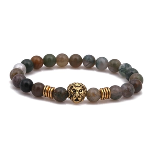 Handmade beaded bracelet with mixed natural stones and a golden lion head charm