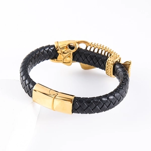 Braided leather bracelet for men with golden dragon head magnetic buckle on white background