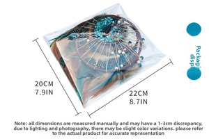 Detailed view of the life tree dream catcher packaged in a clear protective plastic bag