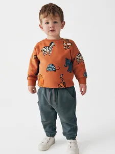 Kids burnt orange sweatshirt with animal prints and dark grey joggers set