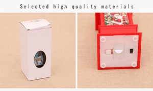 Detail of the LED Christmas lantern base with a power switch and white packaging box