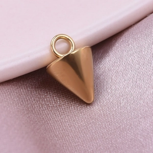 Polished 18k gold plated stainless steel cone pendant on elegant pink silk background