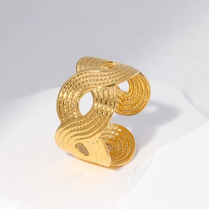 Polished gold wide open ring featuring a unique wavy hollow texture for men and women