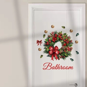 Weihnachtskranz Wandsticker mit goldenen Glocken und Bathroom-Schriftzug auf weißer Tür