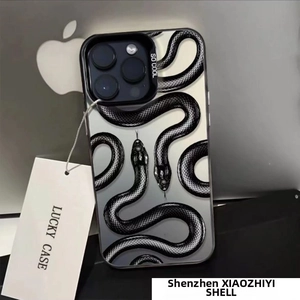 Detail view of iPhone case featuring black and white snakeskin print with SO COOL text