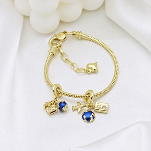 Gold plated bracelet featuring earth, airplane, camera, and passport travel charms
