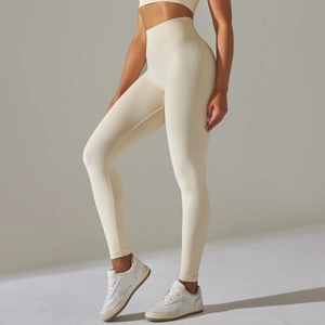 Seamless cream ribbed high waist yoga leggings with athletic compression fit