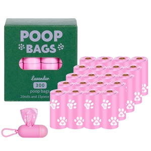 Detailed view of 20 rolls of pink lavender-scented poop bags with a pink dispenser