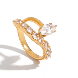 Golden titanium steel ring featuring a marquise-cut zircon and small round accents