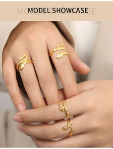 Detailed macro shot of vintage gold snake ring featuring scales and layered textures